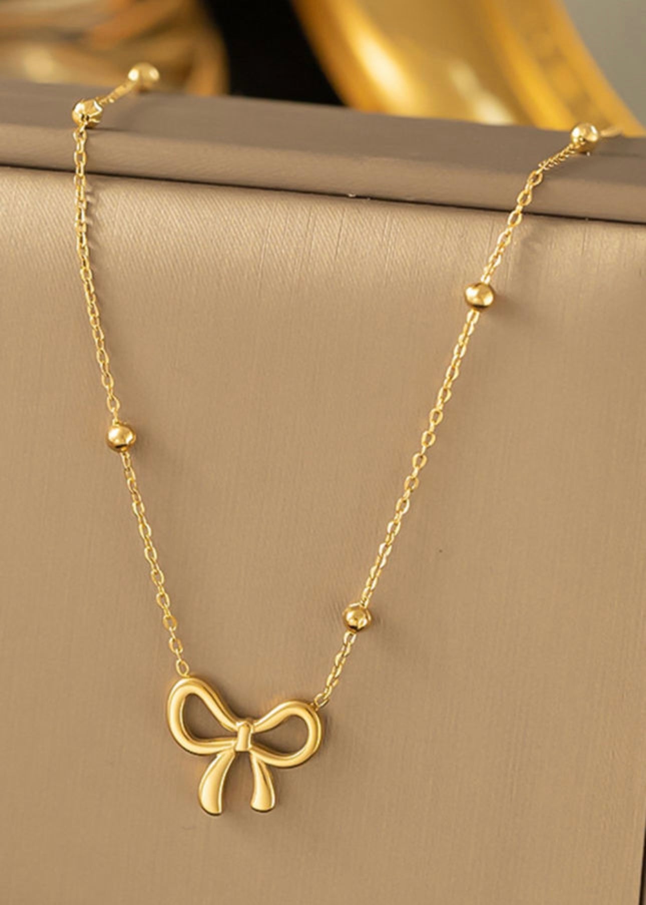 Gold Bowknot Pendant Necklace